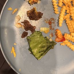 This is part of the cook burger I had to rip off and this is the lettuce that was on the burger. Notice, I didn't even eat the fries.