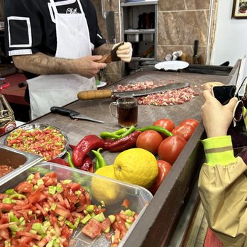 Şeyhmuz Kebap Evi - traditional way to make seyhmuz kepab using a curved cleaver and alot of effort - Kebab Near Me - Istanbul, 34