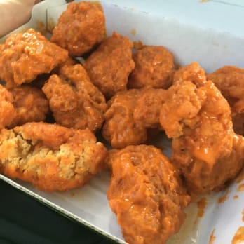 Buffalo Wild Wings - Medium sauce in a medium size - Chicken Wings Near Me - Flint Township, Michigan Buffalo Wild Wings - Medium sauce in a medium size - Chicken Wings Near Me - Flint Township, Michigan