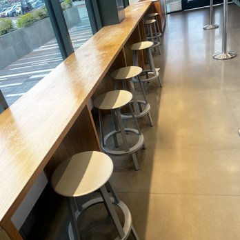 sweetgreen - Healthy Salads, Wraps, and Bowls - Seating area, tables on the other side - Salad Near Me - Oak Brook, Illinois