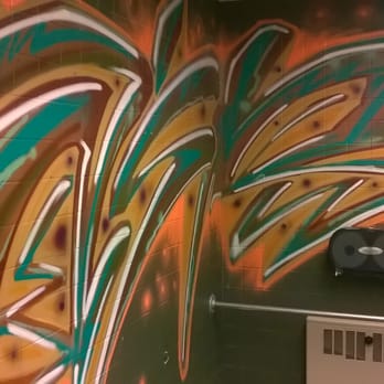 The Underground Tap & Grill - restroom w graffiti - Pubs Near Me - Edmonton, Alberta