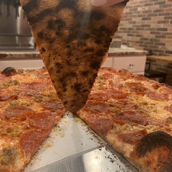 Milestone Wood Fired Pizza - The money shot, nice and crisp! - Pizza Near Me - Thomaston, Connecticut Milestone Wood Fired Pizza - The money shot, nice and crisp! - Pizza Near Me - Thomaston, Connecticut