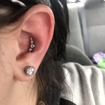 Body By Design - Conch piercing - Tattoo Near Me - Crestwood, Illinois Body By Design - Conch piercing - Tattoo Near Me - Crestwood, Illinois