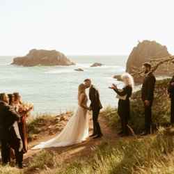 Cindie Wilding - Bird & Nest Ceremonies - Cheers on the Oregon coast!  Love adventure weddings.