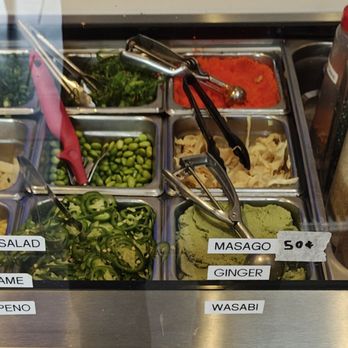 Pokeland - Additional veggies and toppings on display - Hawaiian Near Me - San Diego, California Pokeland - Additional veggies and toppings on display - Hawaiian Near Me - San Diego, California