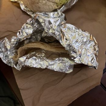 Chipotle Mexican Grill - The extra tortilla we asked them to use to help wrap the burrito. Yet, they just threw it in the bag. - Mexican Near Me - Lehigh Acres, Florida Chipotle Mexican Grill - The extra tortilla we asked them to use to help wrap the burrito. Yet, they just threw it in the bag. - Mexican Near Me - Lehigh Acres, Florida