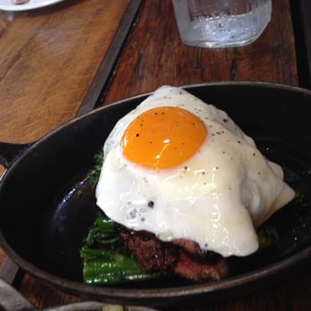 Manhattan Beach Post - White oak grilled 8oz steak and sunny side up egg (with broccolini and red chimichurri) - New American Near Me - Manhattan Beach, California Manhattan Beach Post - White oak grilled 8oz steak and sunny side up egg (with broccolini and red chimichurri) - New American Near Me - Manhattan Beach, California