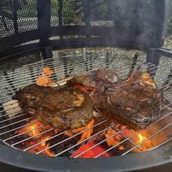 Alexandre Family Farm - Rib eyes and tenderloins over the fire pit!