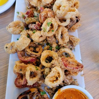 Lure Fish House - Calamari appetizer with two dipping sauces. - Seafood Near Me - Porter Ranch, California Lure Fish House - Calamari appetizer with two dipping sauces. - Seafood Near Me - Porter Ranch, California