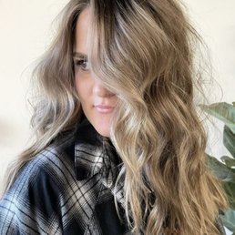 Long, blonde lived in color with curls Long, blonde lived in color with curls
