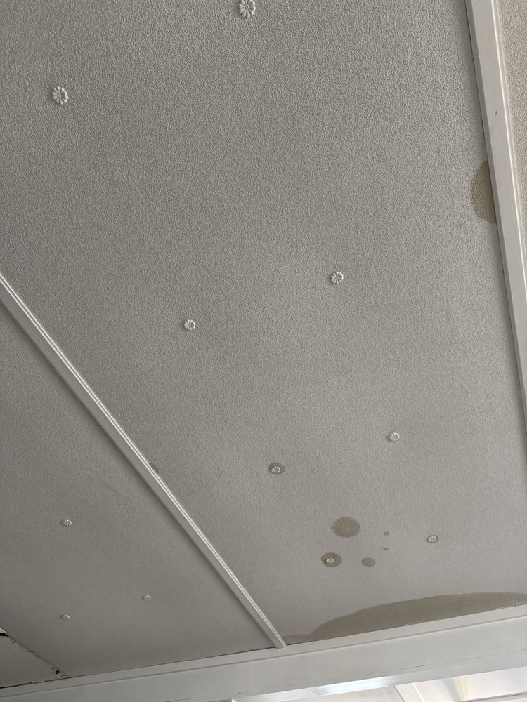 Slide of All Weather Roofing