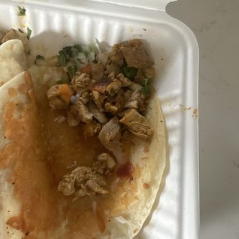 Uno Más Taco Shop - Half pound chicken taco... probably more like 2 tablespoons. No lime half assed.  Won't eat here again - Tacos Near Me - Spokane, Washington