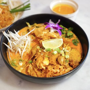 Bangrak - Thai Restaurant - Chicken Khao Soi -- Northern Thai curry noodles with tender chicken and rich, aromatic coconut curry. - Thai Near Me - New York, New York Bangrak - Thai Restaurant - Chicken Khao Soi -- Northern Thai curry noodles with tender chicken and rich, aromatic coconut curry. - Thai Near Me - New York, New York