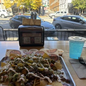 Tres Amigos Athens - Nachos and a Sprite, with a view of Broad St. - Mexican Near Me - Athens, Georgia