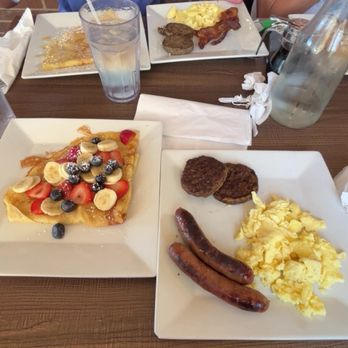 Cracked & Crepe - Crepe with blueberries strawberries and bananas with scrambled eggs and chicken sausage and turkey sausage - Breakfast & Brunch Near Me - Aubrey, Texas Cracked & Crepe - Crepe with blueberries strawberries and bananas with scrambled eggs and chicken sausage and turkey sausage - Breakfast & Brunch Near Me - Aubrey, Texas