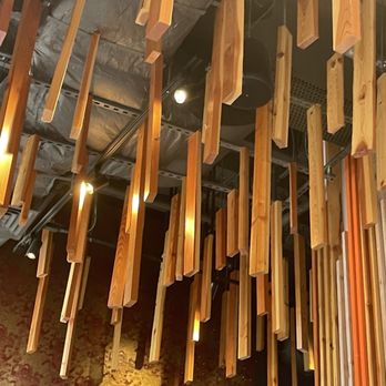 Mecha Noodle Bar - Cool wooden mobiles hanging from ceiling - Ramen Near Me - Brookline, Massachusetts