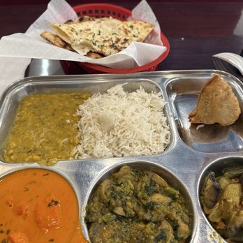 Azaad Indian Cuisine - The Combo with Garlic Naan Bread - Indian Near Me - Riverside, California Azaad Indian Cuisine - The Combo with Garlic Naan Bread - Indian Near Me - Riverside, California