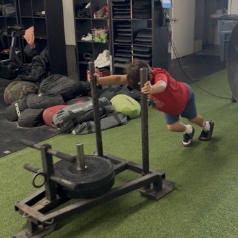 ESTLR Athletics - My son pushing the sled! - Trainers Near Me - Los Angeles, California ESTLR Athletics - My son pushing the sled! - Trainers Near Me - Los Angeles, California