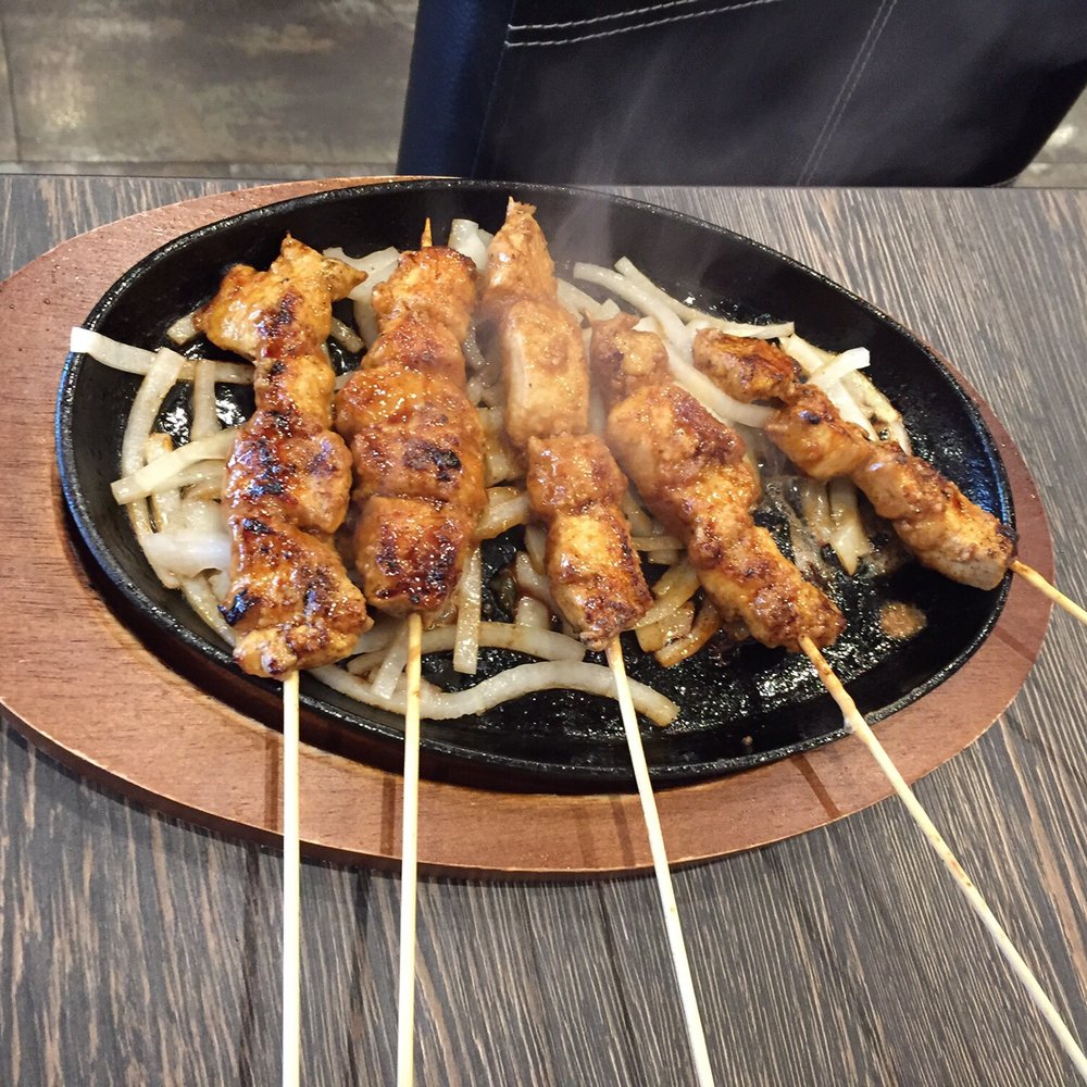 Worlds Magic Restaurant - Chicken Satay - Indonesian Near Me - Orlando, Florida Worlds Magic Restaurant - Chicken Satay - Indonesian Near Me - Orlando, Florida