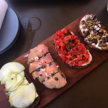 Postino Heights - Apple brie, salmon pesto, red pepper goat cheese and ricotta date/pistachio (NO to this one) - Wine Bars Near Me - Houston, Texas Postino Heights - Apple brie, salmon pesto, red pepper goat cheese and ricotta date/pistachio (NO to this one) - Wine Bars Near Me - Houston, Texas