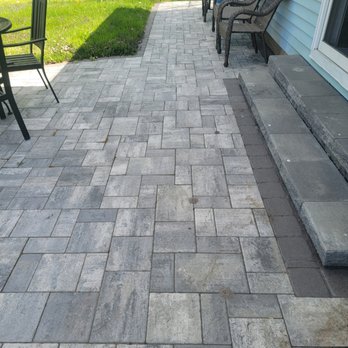 A-Choice Landscaping - a patio with a brick paver - Landscaping Near Me