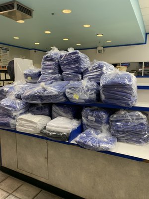 Commercial Laundry Services - 194lbs of graduation gowns for middle school. All gowns sorted by size and individually packaged in its own zippered bag to hand to students. Commercial Laundry Services - 194lbs of graduation gowns for middle school. All gowns sorted by size and individually packaged in its own zippered bag to hand to students.