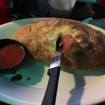 Micelis Waterfront Restaurant - The calzone is HUGH. - Italian Near Me - Matlacha, Florida Micelis Waterfront Restaurant - The calzone is HUGH. - Italian Near Me - Matlacha, Florida