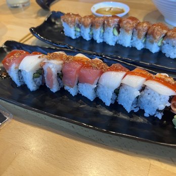 Tamashi - Raku Roll - yellowtail , jalapeno, tuna, escolar, roasted garlic, ponzu sauce, sriracha. - Ramen Near Me - Houston, Texas Tamashi - Raku Roll - yellowtail , jalapeno, tuna, escolar, roasted garlic, ponzu sauce, sriracha. - Ramen Near Me - Houston, Texas