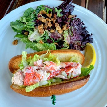 The Freight Shed - Delicious Lobster Roll with lovely side salad. - Canadian (New) Near Me - Baddeck, Nova Scotia