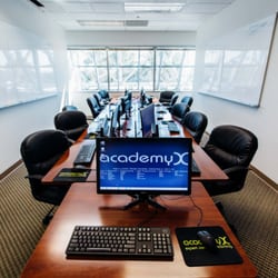 AcademyX - Our mid-sized classroom comfortably holds up to a maximum of 12 students.