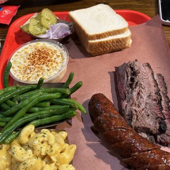 Terry Black's Barbecue - Brisket, jalapeño and cheese sausage with side of Mac and cheese, green beans and creamy corn. - Barbeque Near Me - Austin, Texas Terry Black's Barbecue - Brisket, jalapeño and cheese sausage with side of Mac and cheese, green beans and creamy corn. - Barbeque Near Me - Austin, Texas