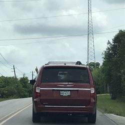 Texas Togo - This is the driver. You can see their black company sign on the top passengers side. I have others