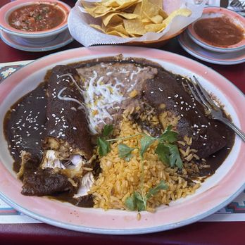 Casa Lupe - Chicken Mole' enchiladas. I was scooping up the sauce with the tortilla chips. Just really yummy! - Mexican Near Me - Sunnyvale, California