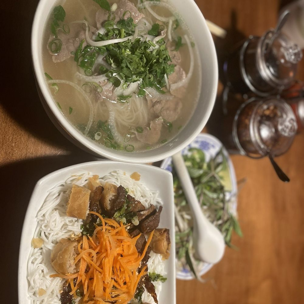 Mekong Authentic Vietnamese Cuisine - Beef pho and rice noodle bowl with pork and egg roll. - Vietnamese Near Me - Sandusky, Ohio Mekong Authentic Vietnamese Cuisine - Beef pho and rice noodle bowl with pork and egg roll. - Vietnamese Near Me - Sandusky, Ohio