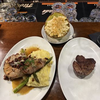 Serrato's Steakhouse - bourbon glaze pork chop & 6 oz filet mignon with truffle mac'ncheese - Steakhouses Near Me - Franklin, Tennessee