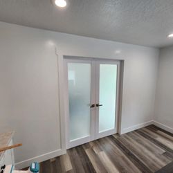 High Mountain Home Professionals - Framed to finish on a beautiful separation wall with gorgeous Sartodoors double French doors.