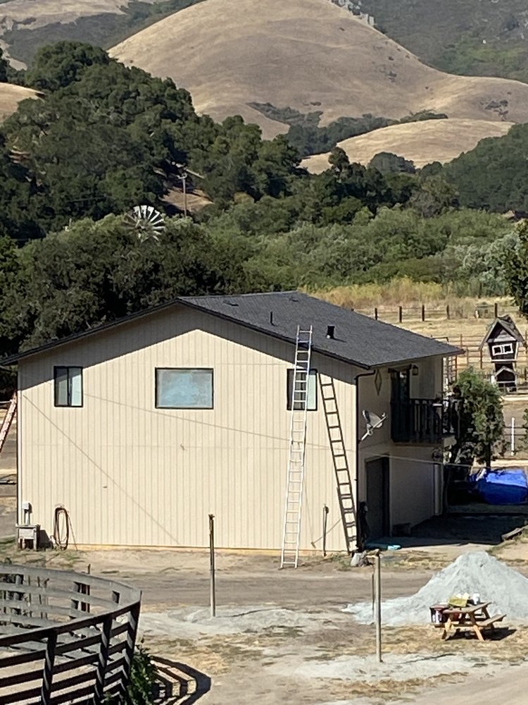 Slide of McGraw and Sons Roofing