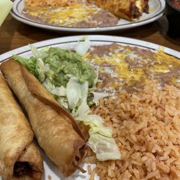 A birria taco plate and a beef flauta plate Yeum !!