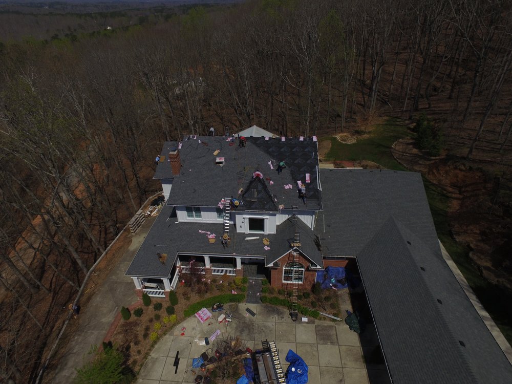 Slide of Suburban Roofing