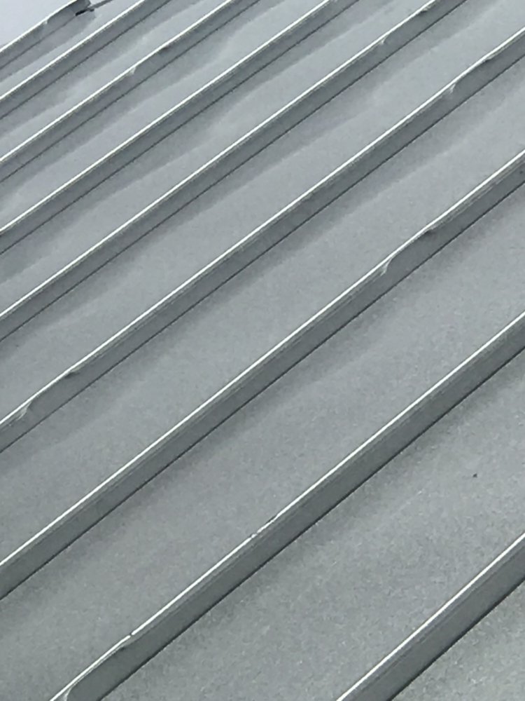 Slide of Roofs By Robert