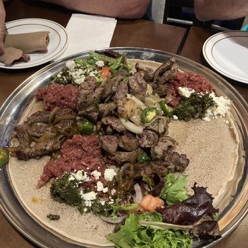 Chercher Ethiopian Restaurant and Bar - Kitfo and two different steak meals (forgot the names). - Bars Near Me - Washington, DC, District of Columbia Chercher Ethiopian Restaurant and Bar - Kitfo and two different steak meals (forgot the names). - Bars Near Me - Washington, DC, District of Columbia