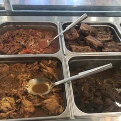 Our daily selection of meats include... Oxtail, Goat, Ropa Vieja, Pork Ribs, Beef Ribs, Seasoned, Fried & Baked Chicken, Pork, & Meatballs.