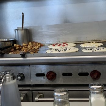 Lighthouse Cafe - Grill cooking potatoes and fruit pancakes - Breakfast & Brunch Near Me - Sausalito, California Lighthouse Cafe - Grill cooking potatoes and fruit pancakes - Breakfast & Brunch Near Me - Sausalito, California