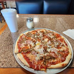 Taste of Italy - Meat lovers personal pizza.