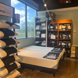 SlumberWorld - They have Tempur-Pedic pillows for your neck and proper support. Lots to choose from