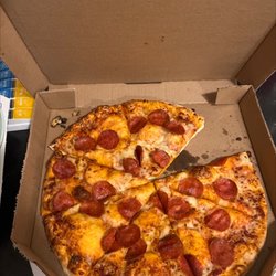 Domino's Pizza - Ordered a Pepperoni pizza. It came with barely any cheese. Also ordered two ranch cups, did not get those.