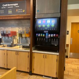a coffee machine and counter in a restaurant a coffee machine and counter in a restaurant