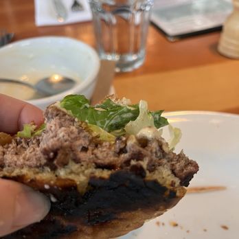 Cafe Bernardo - Overcooked burger on a black burnt to a crisp bun for almost $18 Lol i wont be returning. - Breakfast & Brunch Near Me - Sacramento, California