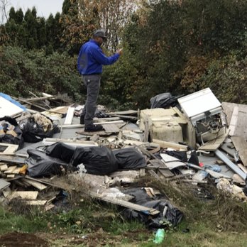 Junk It Junk Removal - Out in the field estimating a debris pile. Junk IT Junk Removal can handle dle jobs large and small - Junk Removal & Hauling Near Me - Portland, Oregon