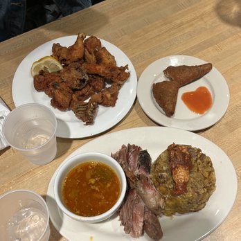 Casa Adela - Top- Chicharon De Pollo Middle Right- Alcapurria Bottom- Mofongo with Pernil - Latin American Near Me - New York, New York Casa Adela - Top- Chicharon De Pollo Middle Right- Alcapurria Bottom- Mofongo with Pernil - Latin American Near Me - New York, New York